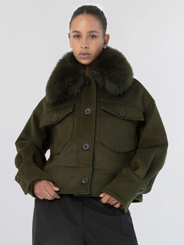Stylish olive green jacket with a luxurious fur collar, featuring button closures and front pockets, by MEOTINE.