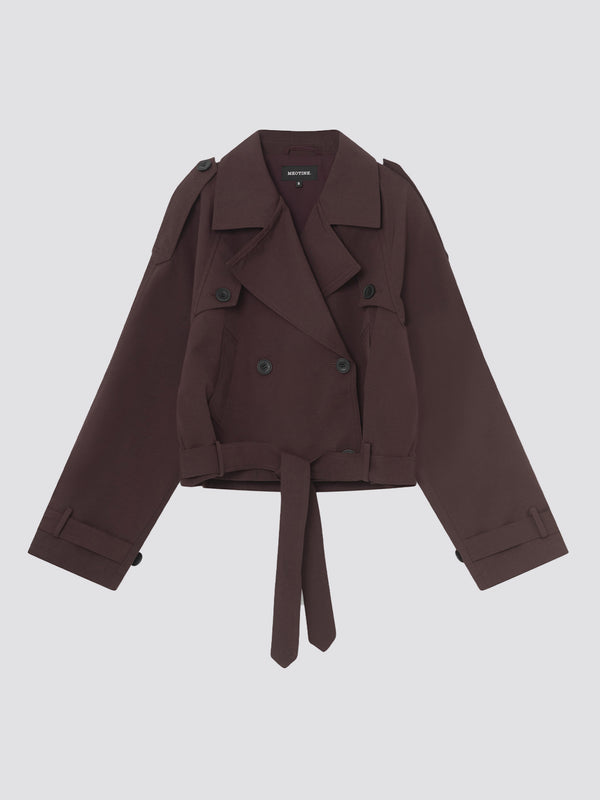 Stylish cropped trench coat in deep burgundy with double-breasted buttons and a belted waist, perfect for a chic look by MEOTINE.