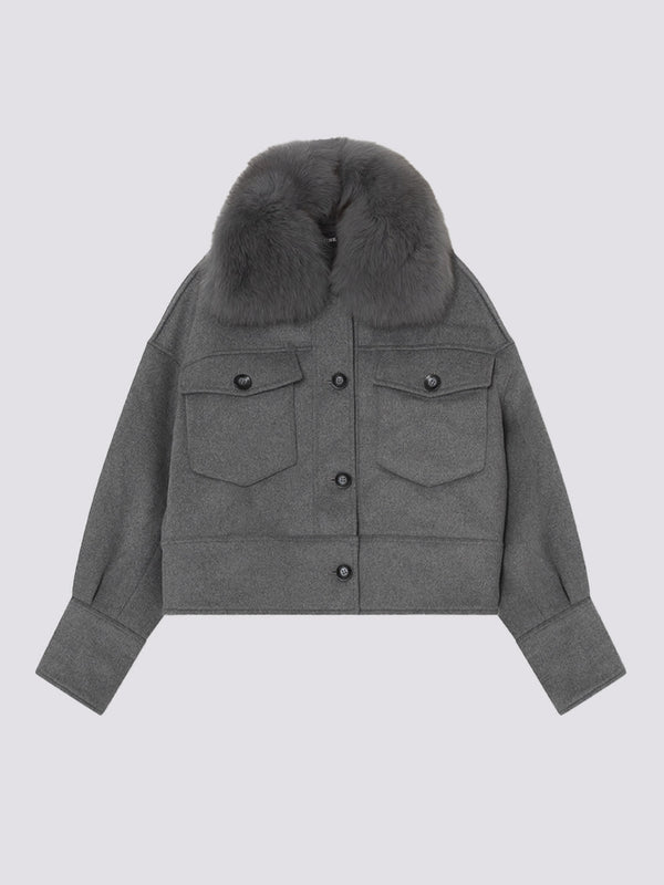 Gray cropped jacket with a fur collar and two front pockets, featuring button closures. Perfect for stylish layering by MEOTINE.