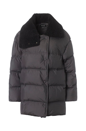 Stylish black puffer jacket with a cozy faux fur collar, perfect for winter warmth. Designed by MEOTINE for a chic look.