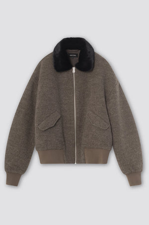Cozy brown bomber jacket with a faux fur collar and side pockets, perfect for stylish warmth. MEOTINE offers chic comfort.