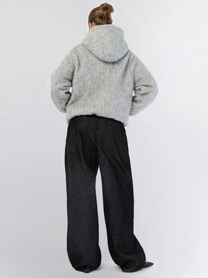 Cozy gray hoodie with a relaxed fit, paired with wide-leg black pants, showcasing a casual yet stylish look by MEOTINE.