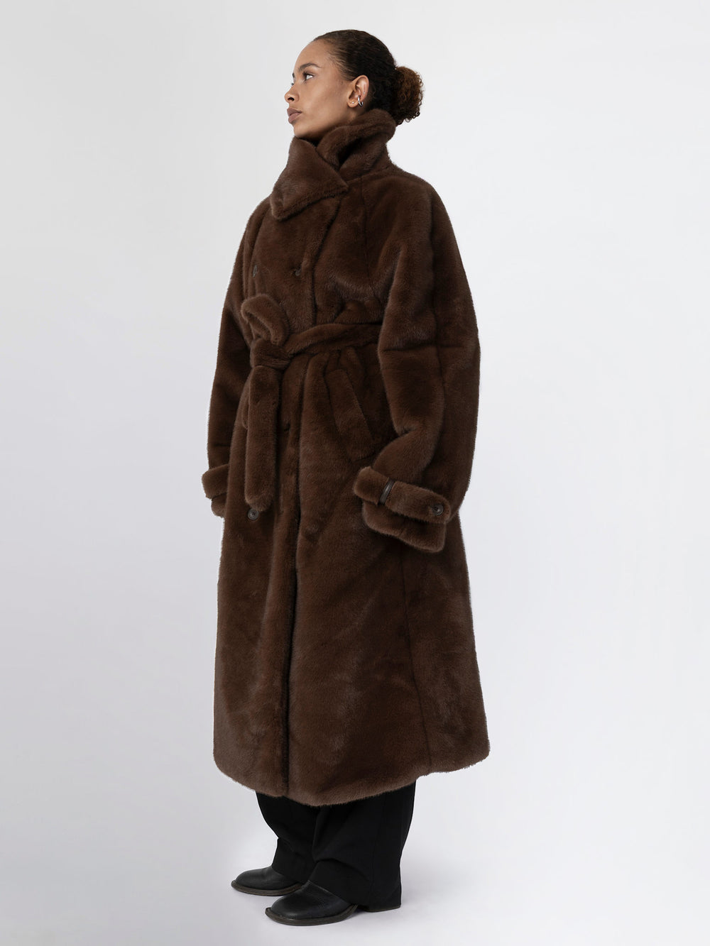 Cozy brown faux fur coat by MEOTINE, featuring a belted waist and oversized fit, perfect for stylish warmth in colder weather.