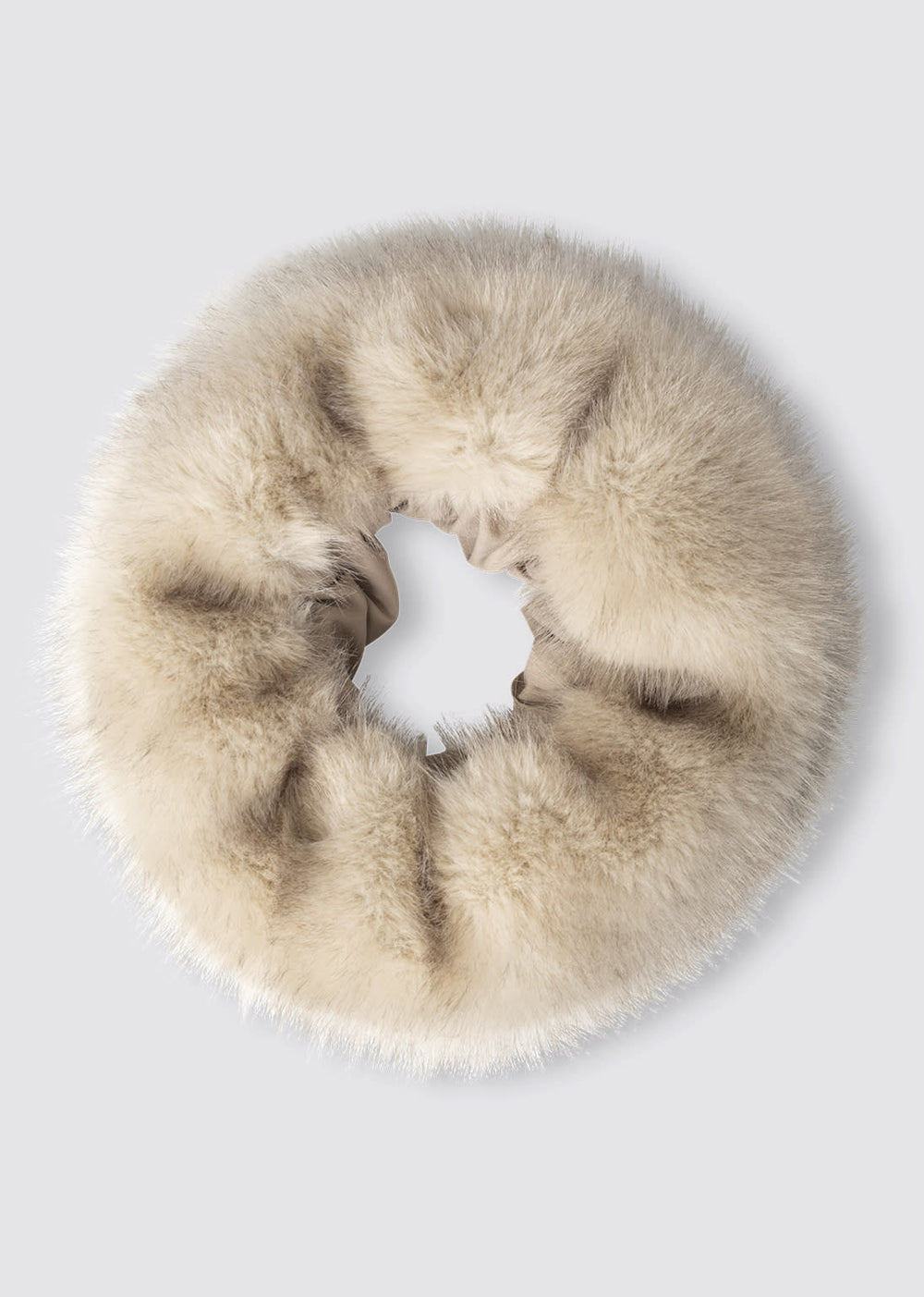 A model wearing a soft, fluffy beige hat paired with a dark brown leather jacket, showcasing MEOTINE's stylish winter accessory.
