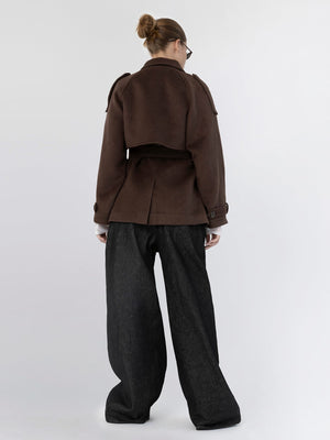 Stylish brown cropped jacket with shoulder details, paired with wide-leg dark pants, showcasing a modern MEOTINE look from the back.