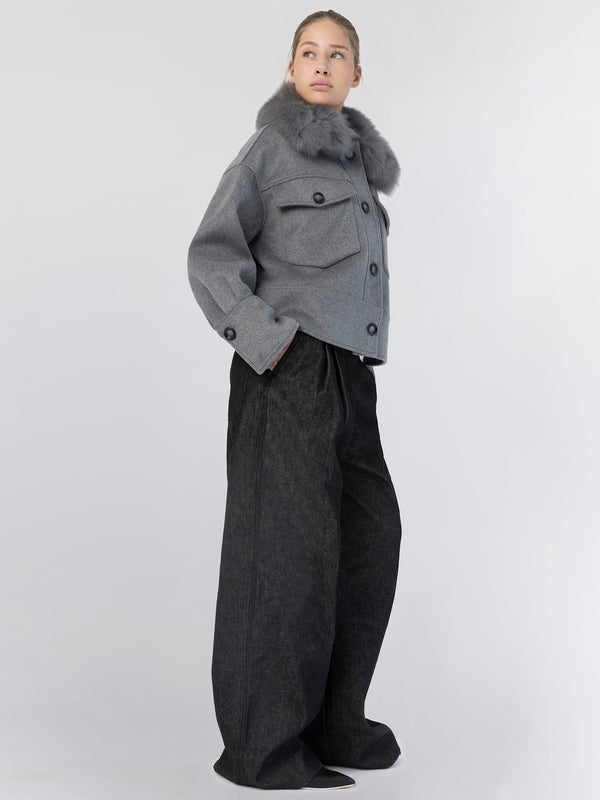 A model showcases a stylish gray cropped jacket with a fur collar, paired with wide-leg black pants, embodying MEOTINE's chic aesthetic.