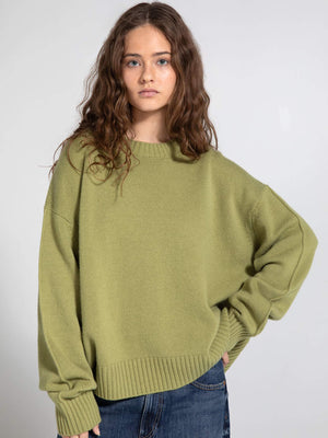 Cozy oversized green sweater by MEOTINE, featuring a relaxed fit and ribbed hem, perfect for casual layering.