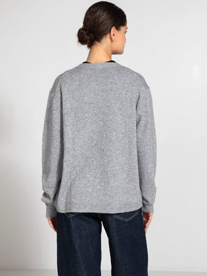 Cozy gray sweater from MEOTINE, featuring a relaxed fit and soft texture, perfect for casual layering.