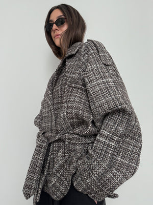 Stylish oversized brown plaid coat with a belted waist, worn by a model in sunglasses, showcasing MEOTINE's chic design.