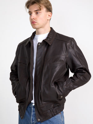 Stylish brown leather jacket by MEOTINE, featuring a classic design with front pockets and a comfortable fit.