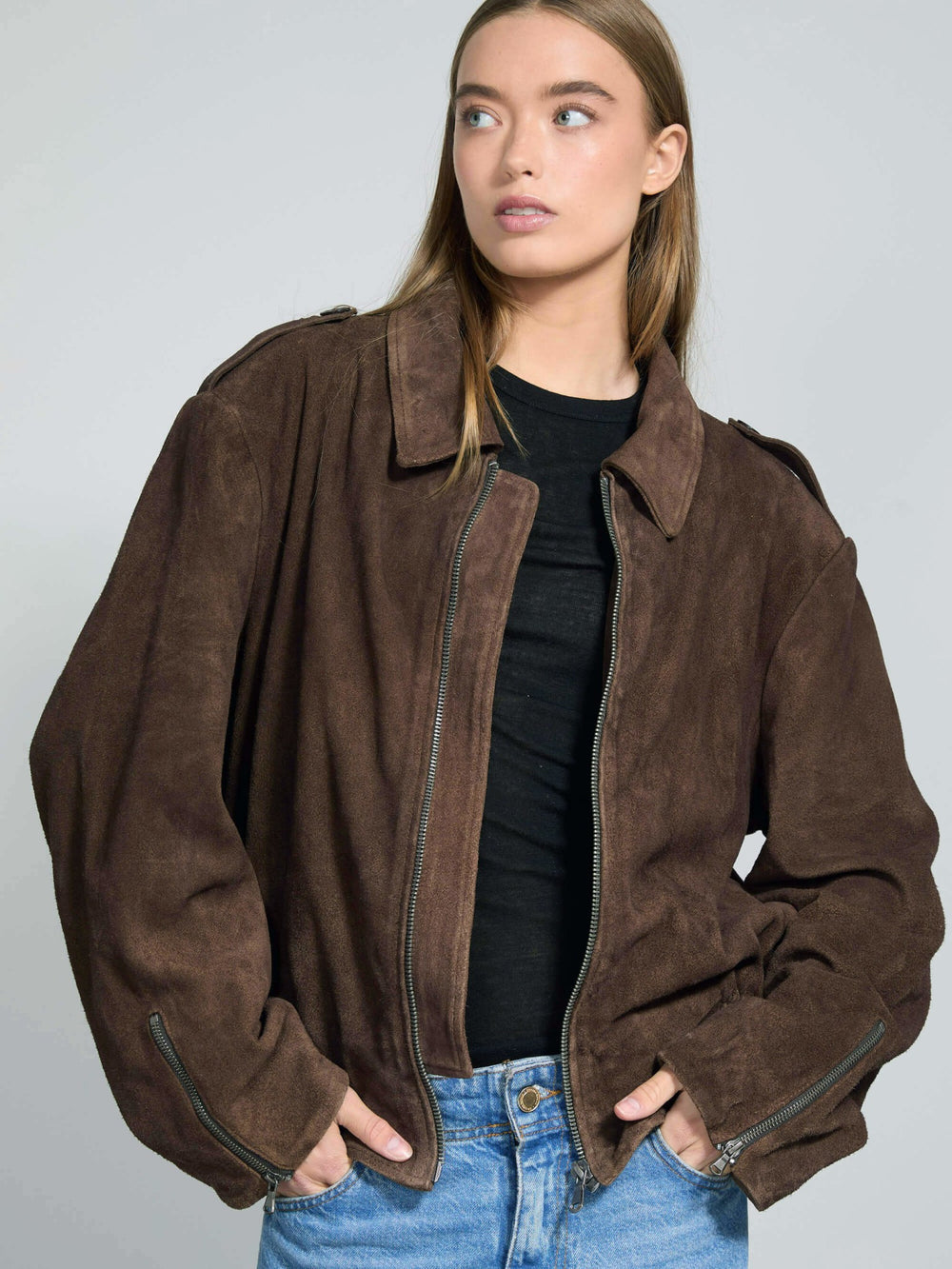 Brown suede oversized jacket with a zip closure, featuring a classic collar and side pockets, styled by MEOTINE.