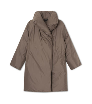 Stylish oversized brown puffer coat with a unique collar design, perfect for warmth and comfort. By MEOTINE.