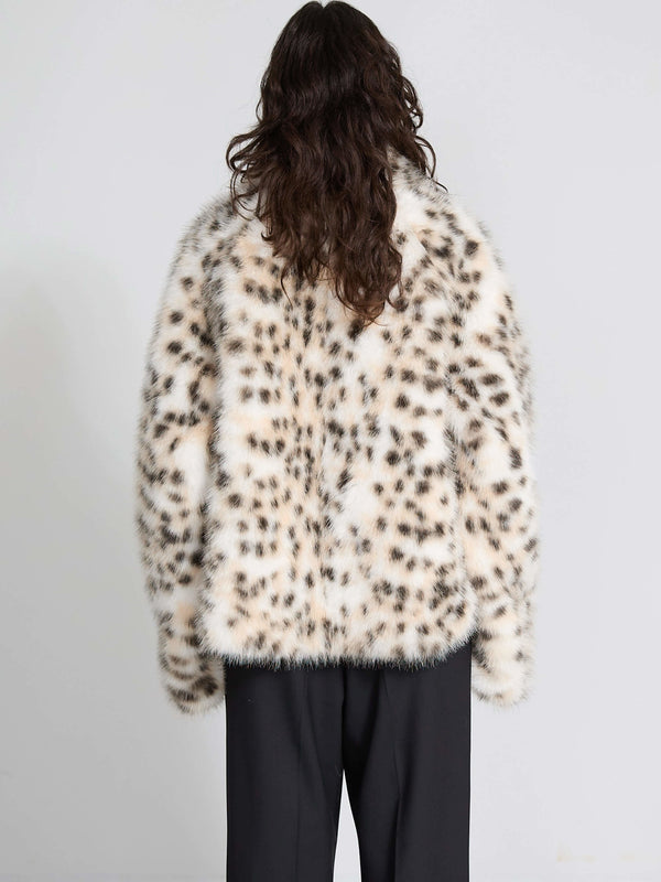 Cozy faux fur jacket with a leopard print design, featuring a relaxed fit and soft texture, perfect for stylish layering by MEOTINE.