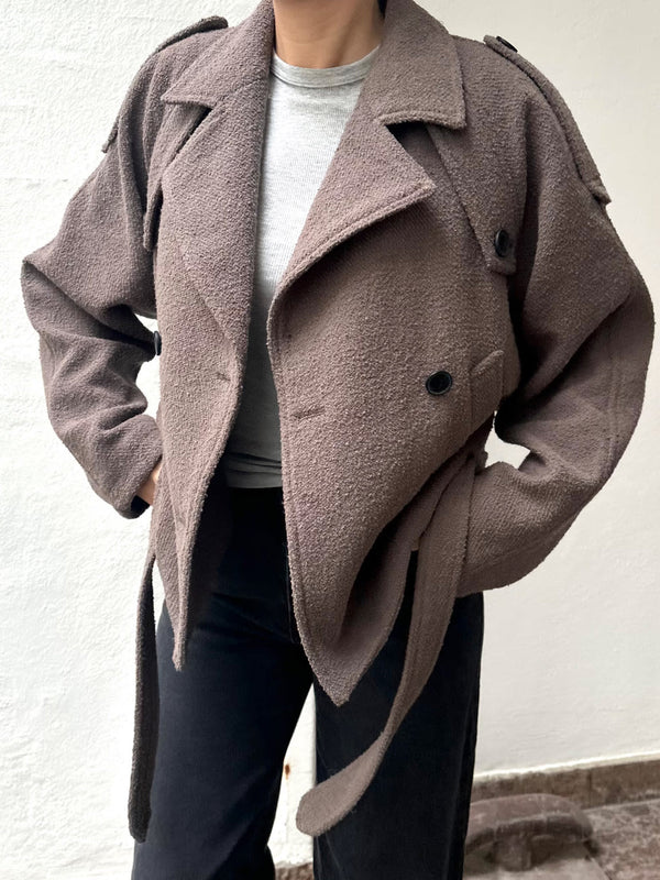 Stylish brown MEOTINE jacket with a belted waist, featuring a classic trench design and oversized fit, perfect for layering.
