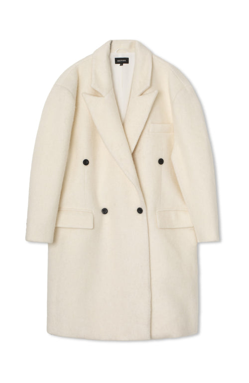Cream-colored double-breasted coat with black buttons and a relaxed fit, perfect for stylish layering by MEOTINE.