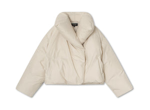 Stylish cream puffer jacket with a unique collar design, perfect for winter layering. Ideal for a chic, cozy look by MEOTINE.
