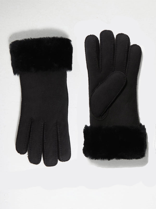 Stylish black gloves with a soft fur cuff, perfect for winter, featuring a sleek design by MEOTINE.