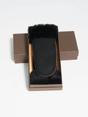 Elegant black fur phone case by MEOTINE, presented in a stylish brown box, perfect for luxury protection and style.