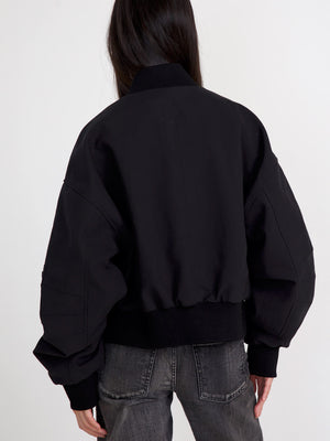 Stylish black cropped jacket with voluminous sleeves, perfect for a trendy look. Designed by MEOTINE for a modern aesthetic.
