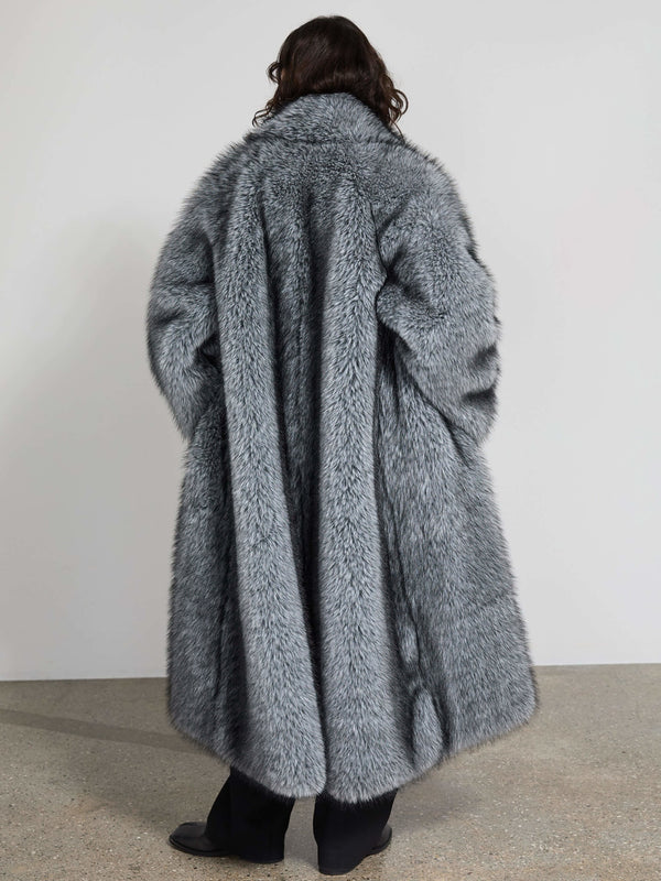 Luxurious gray faux fur coat by MEOTINE, featuring a voluminous silhouette and soft texture, perfect for stylish winter warmth.