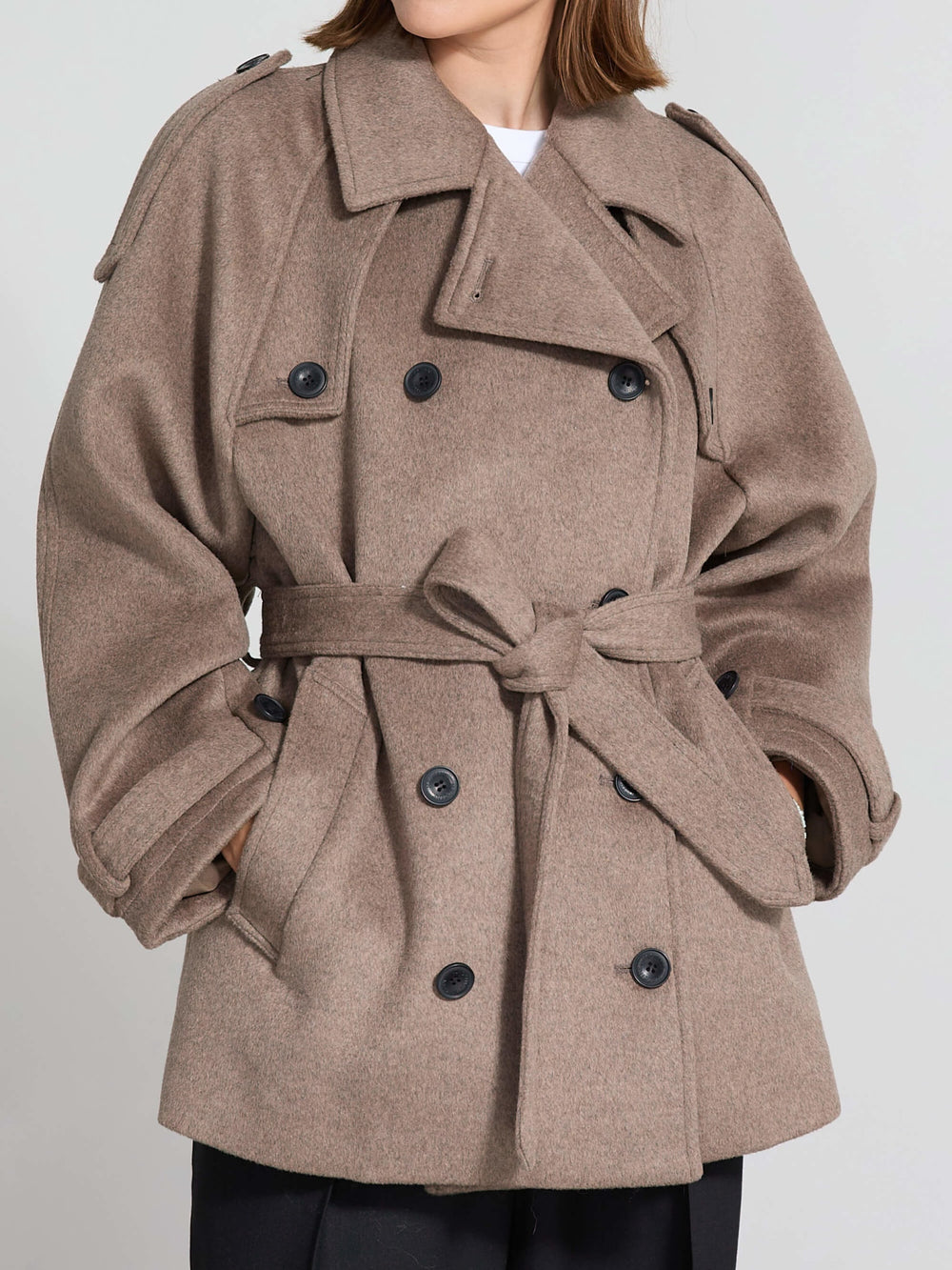 Stylish brown belted coat with a structured silhouette, featuring large buttons and a cozy collar, perfect for a chic look by MEOTINE.