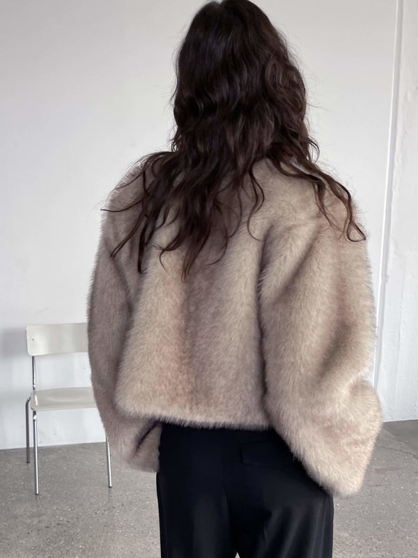 Cozy beige fluffy sweater from MEOTINE, featuring a relaxed fit and soft texture, perfect for a stylish, comfortable look.