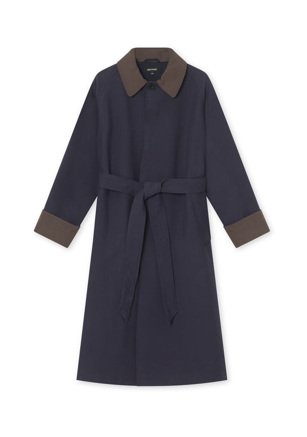Stylish navy trench coat with a brown collar and cuffs, featuring a belted waist for a flattering fit. Perfect for any occasion. MEOTINE.